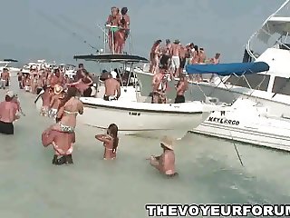 Group of babes dancing and flashing on some boats